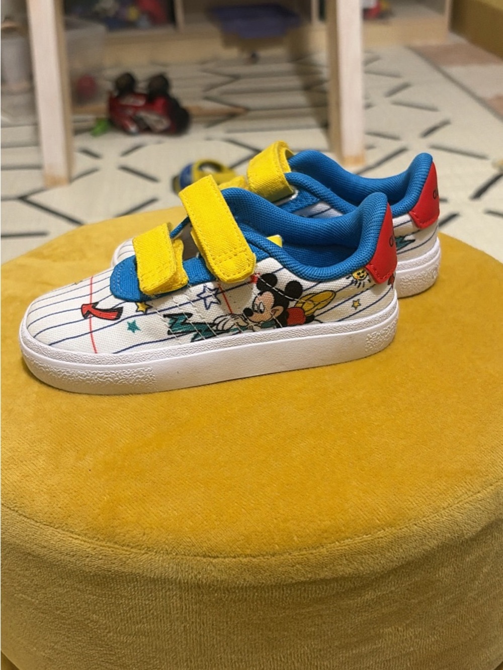 adidas Kids White Sneakers with Blue, Yellow & Red Accents